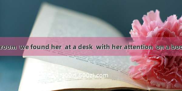 In the reading room  we found her  at a desk  with her attention  on a book.A. seating; fi